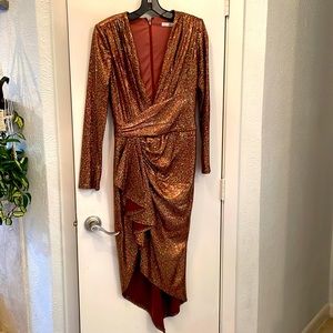 Dress shimmers in the light! Satin style lined fabric, sleeves thinly lined